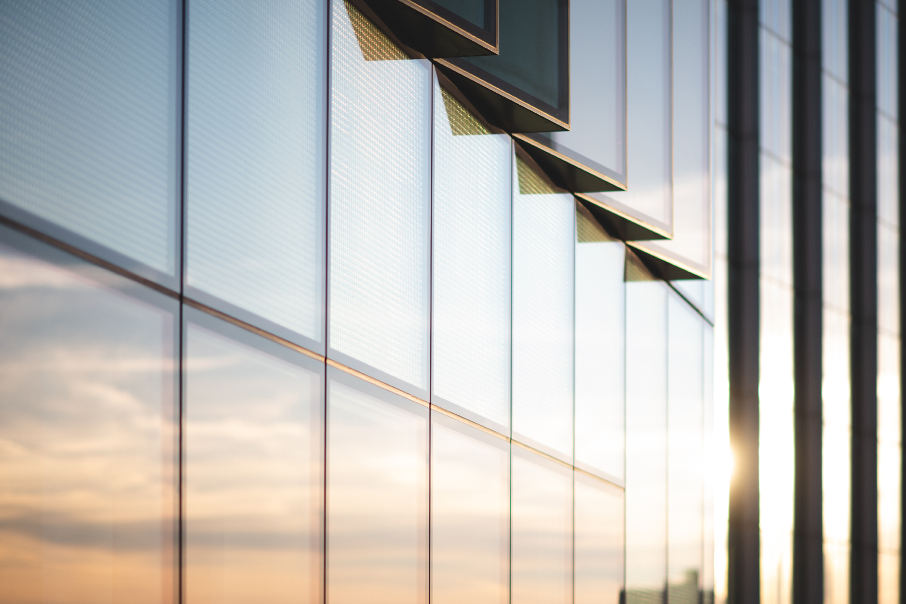 Exterior of Liberum's offices at sunset. 